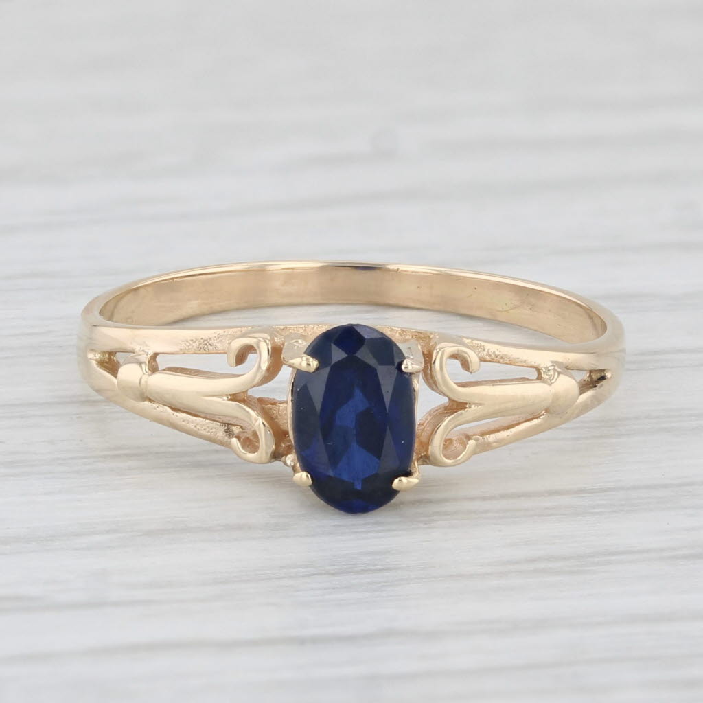 Light Gray 0.57ct Lab Created Oval Blue Sapphire Solitaire Ring 14k Yellow Gold Size 6.25