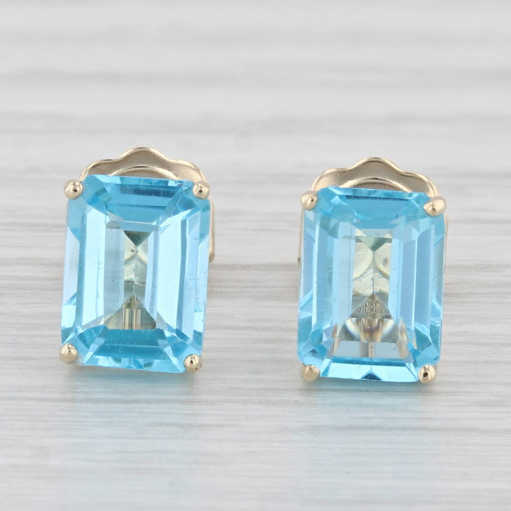 Light Gray 4ctw Blue Topaz Stud Earrings 10k Yellow Gold Emerald Cut Solitaires