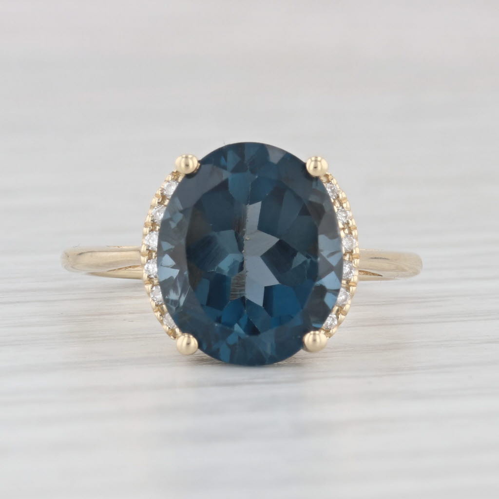 Light Gray 6.06ctw Oval London Blue Ring 10k Yellow Gold Size 7 Diamond Accents