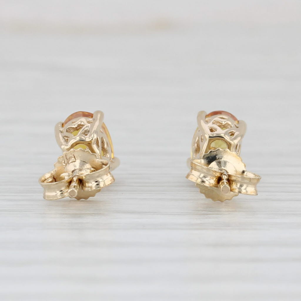 Light Gray 1.20ctw Oval Orange Citrine Solitaire Stud Earrings 10k Yellow Gold