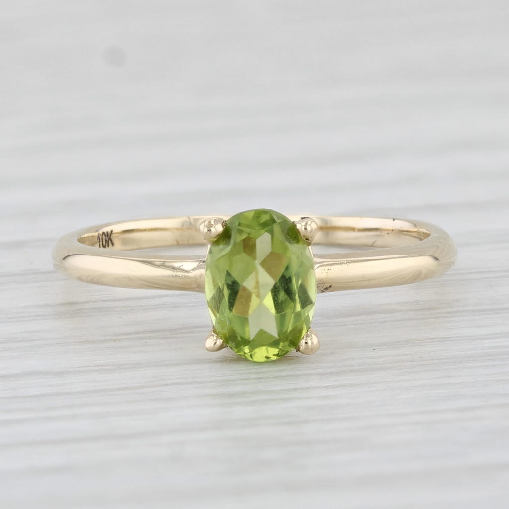 Light Gray 0.85ct Oval Peridot Solitaire Ring 10k Yellow Gold Size 6