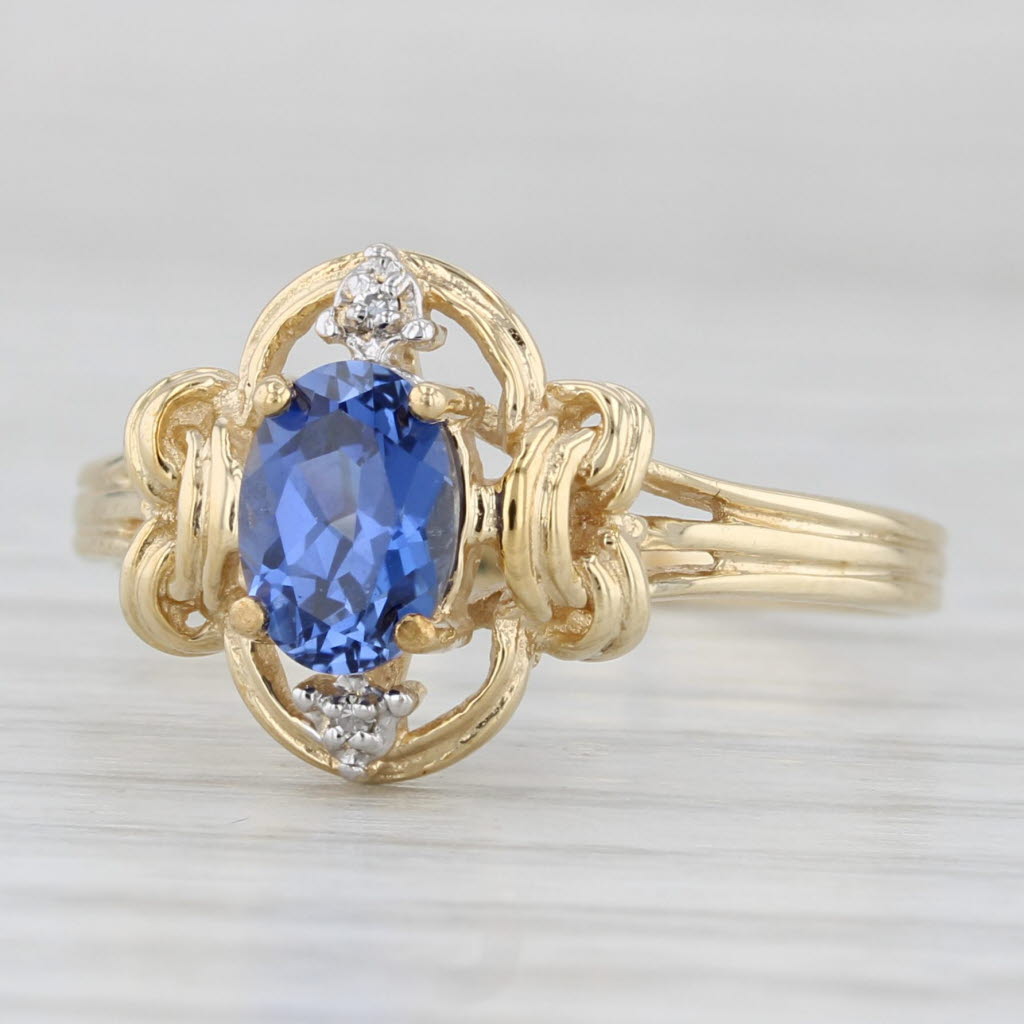 Light Gray 1.12ctw Oval Blue Lab Created Sapphire Diamond Ring 10k Yellow Gold Size 8.5