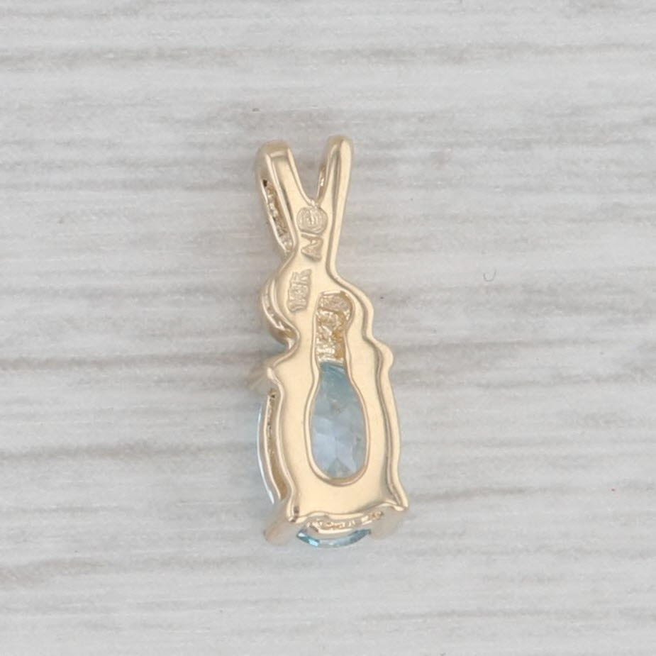 Gray 0.55ct Oval Blue Topaz Pendant 10k Yellow Gold Small Drop