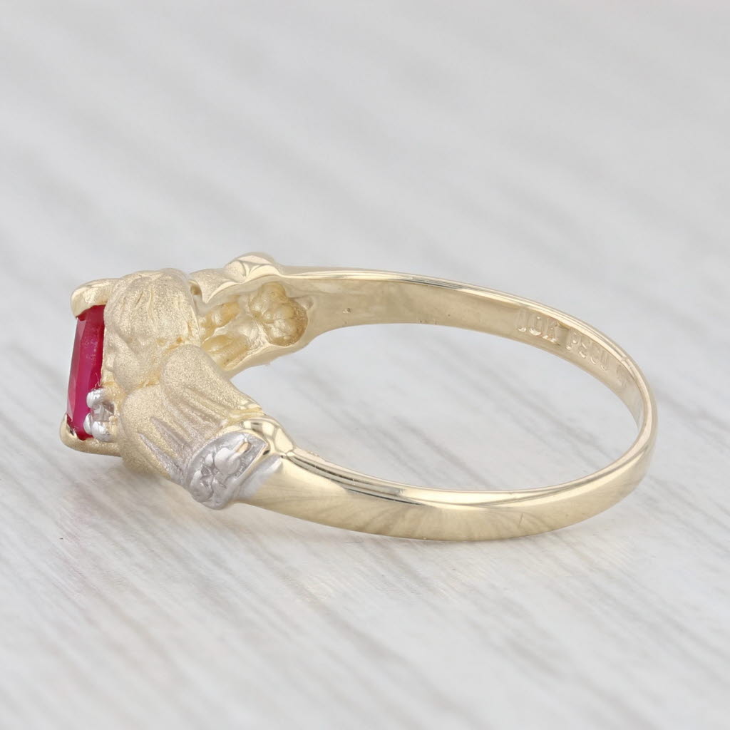 Light Gray 0.20ctw Lab Created Ruby Cherub Ring 10k Yellow Gold Diamond Accents Size 6.75