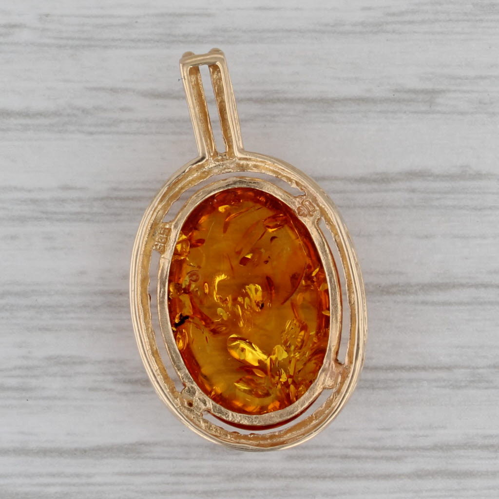 Gray Spangled Amber Oval Cabochon Solitaire Pendant 14k Yellow Gold