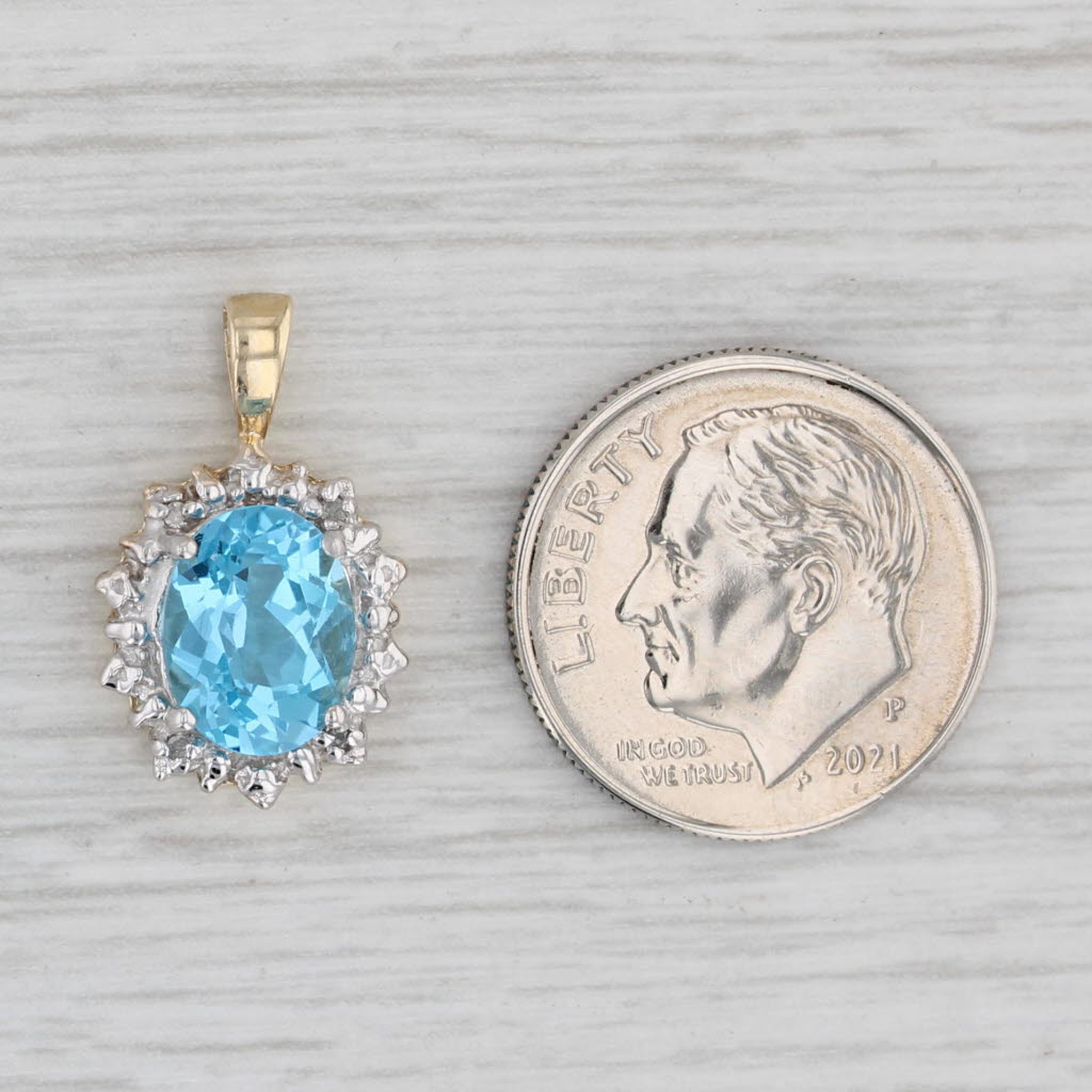 Gray 2.25ct Oval Blue Topaz Pendant 10k Yellow Gold Diamond Accents