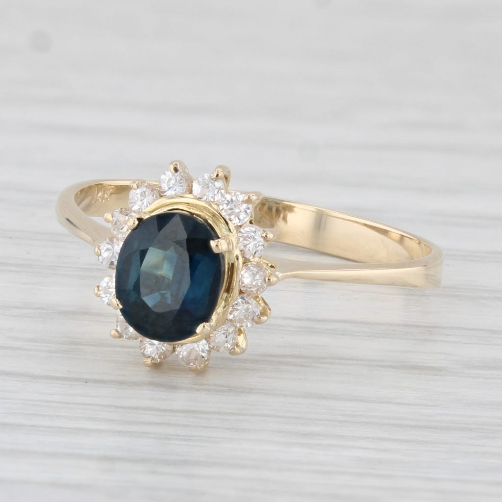 Light Gray 0.97ctw Oval Blue Sapphire Cubic Zirconia Halo Ring 14k Yellow Gold Size 7.5