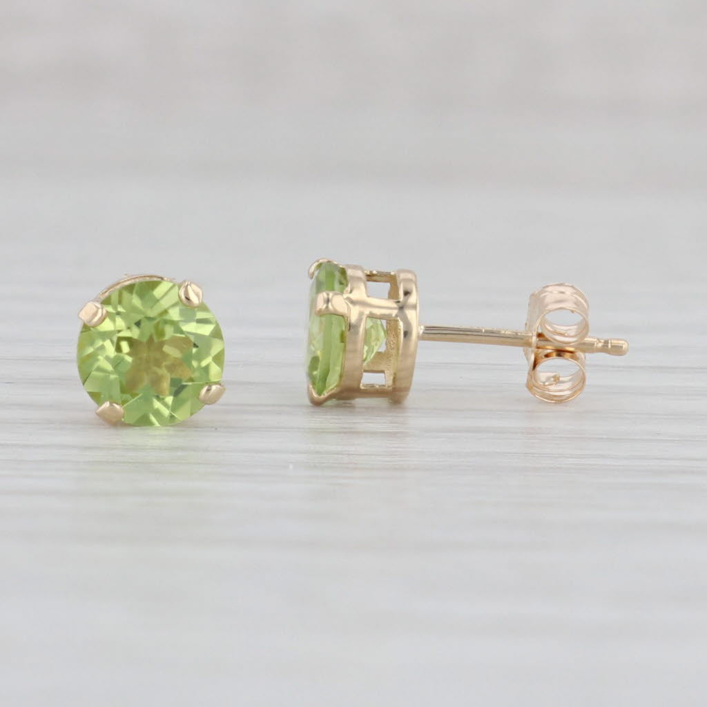 Light Gray 1.90ctw Round Peridot Stud Earrings 14k Yellow Gold August Birthstone