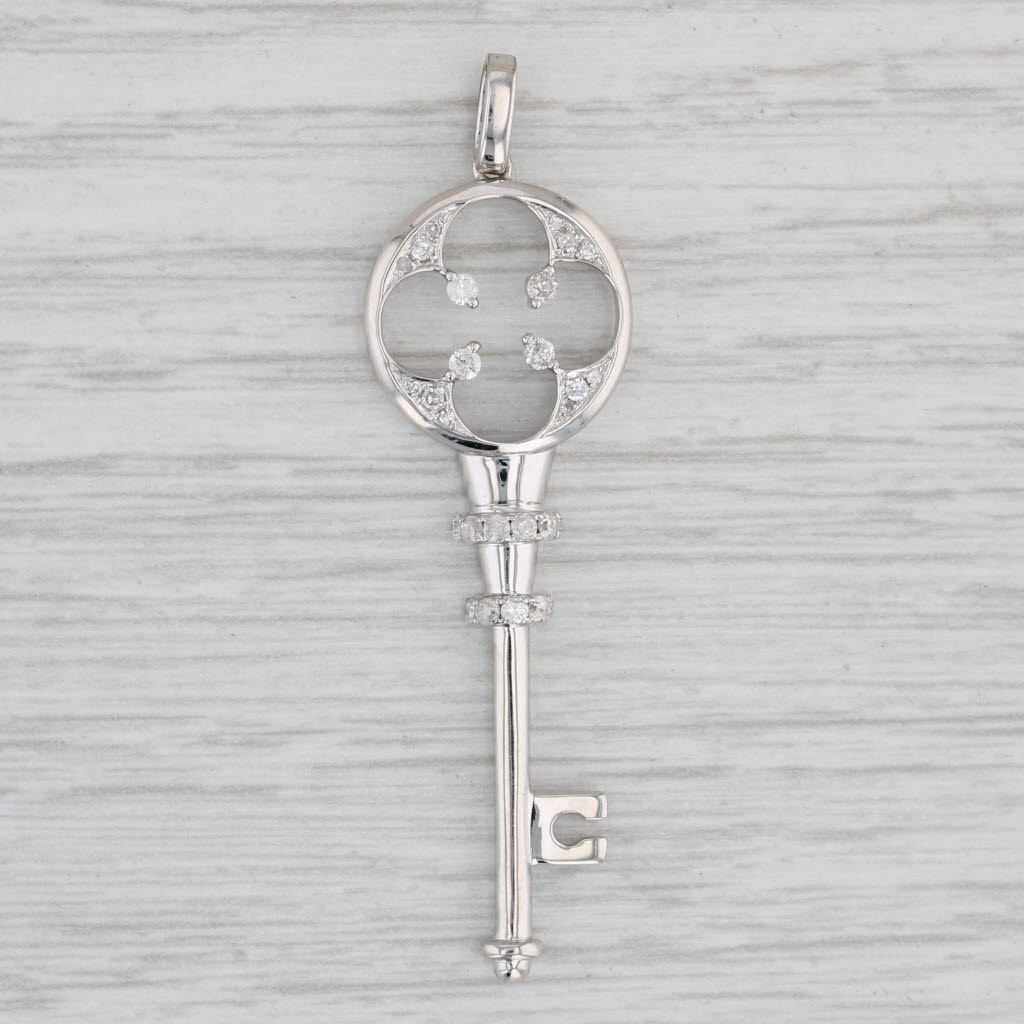 Light Gray 0.25ctw Diamond Accented Skeleton Key Pendant 10k White Gold Charm