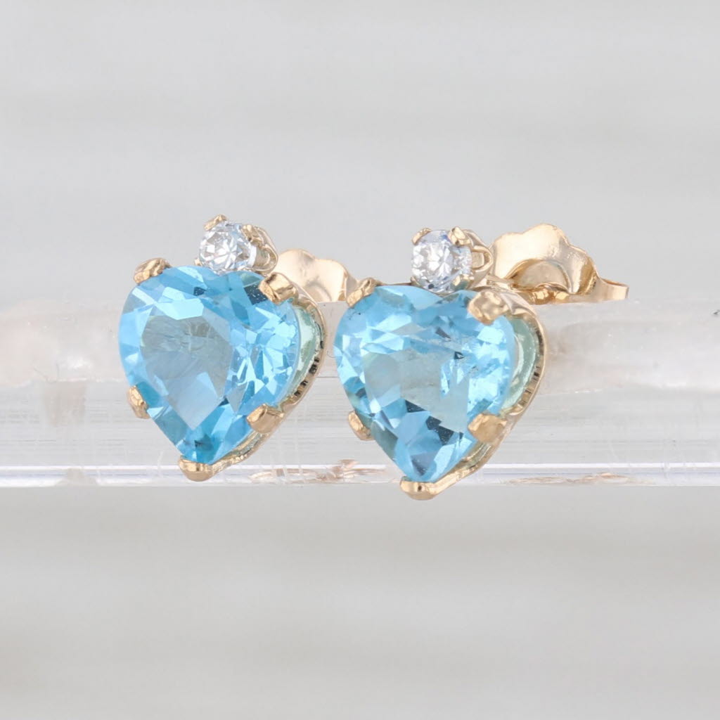 2.06ctw Blue Topaz Heart Stud Earrings 10k Yellow Gold Studs Cubic Zirconias