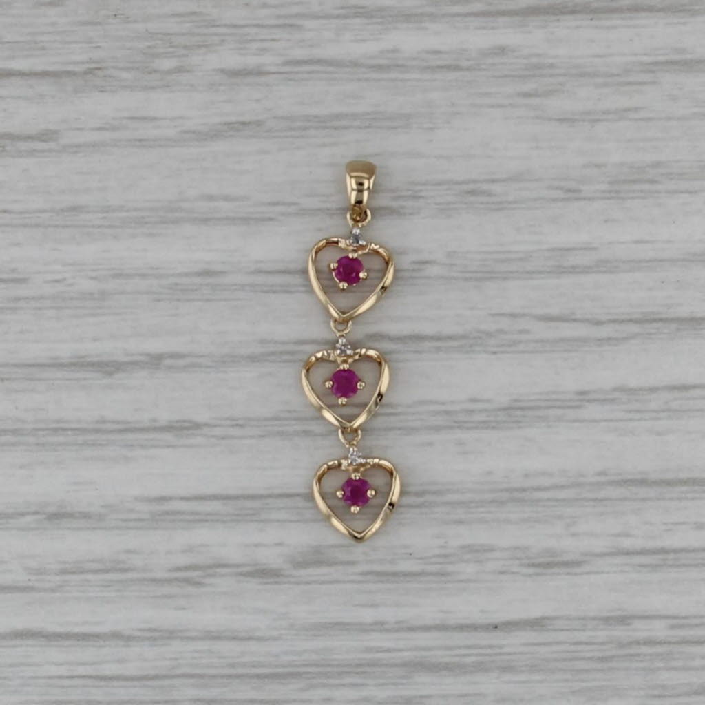 0.24ctw 3-Stone Ruby Hearts Pendant 14k Yellow Gold Journey Drop