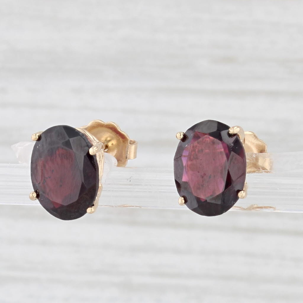 Light Gray 4.40ctw Red Garnet Stud Earrings 14k Yellow Gold Oval Solitaire Studs