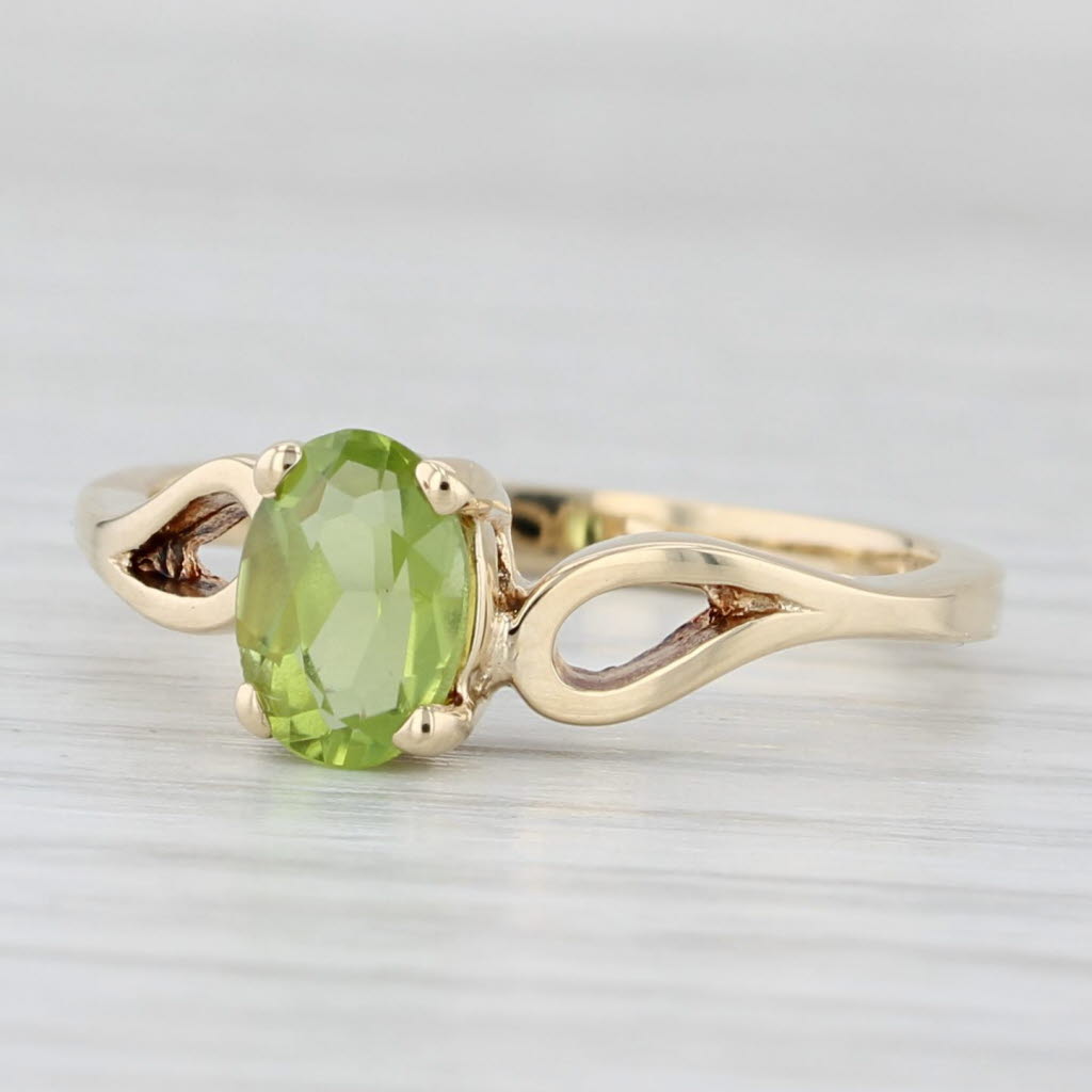 Light Gray 0.85ct Oval Peridot Solitaire Ring 14k Yellow Gold Size 6.75