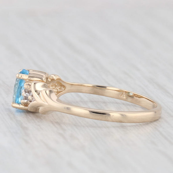 Light Gray 0.60ctw Oval Blue Topaz Diamond Ring 14k Yellow Gold Size 6.25
