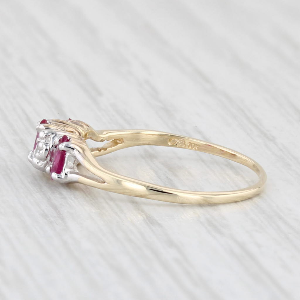 Light Gray 0.30ctw Marquise Ruby 3-Stone Ring 10k Yellow Gold Size 5.25 Diamond Accents