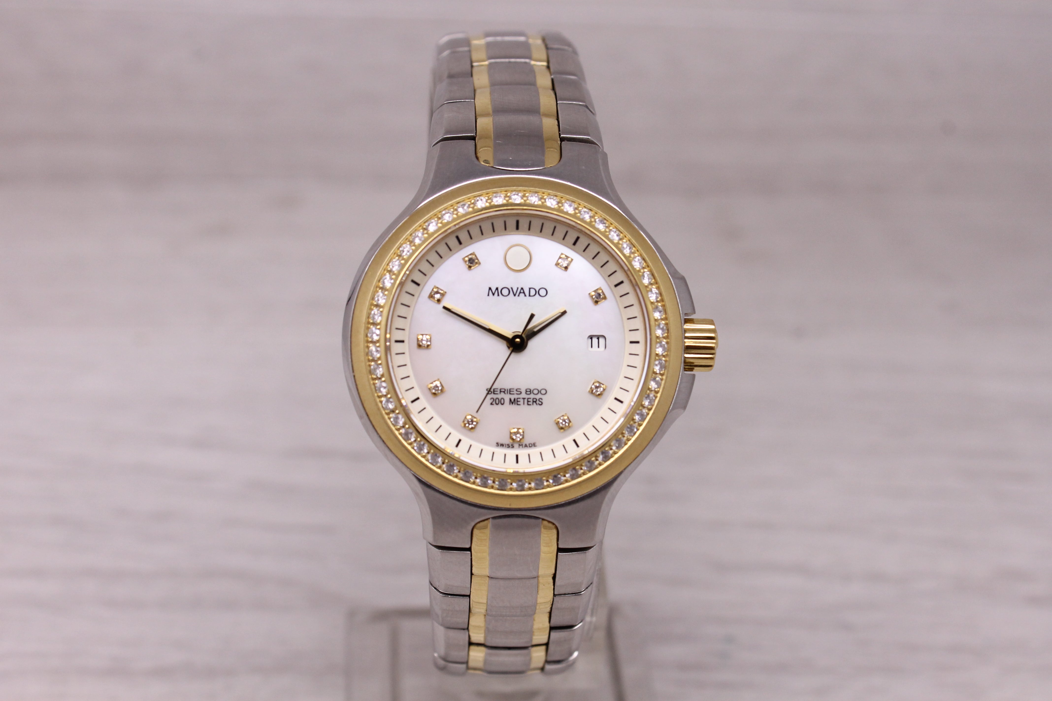 Movado Ladies Series 800 Diamond Bezel MOP 30mm Watch Two-Tone Steel Quartz Date
