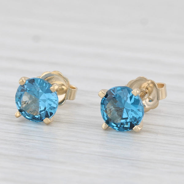 1.50ctw Lab Created Blue Spinel Stud Earrings 14k Yellow Gold