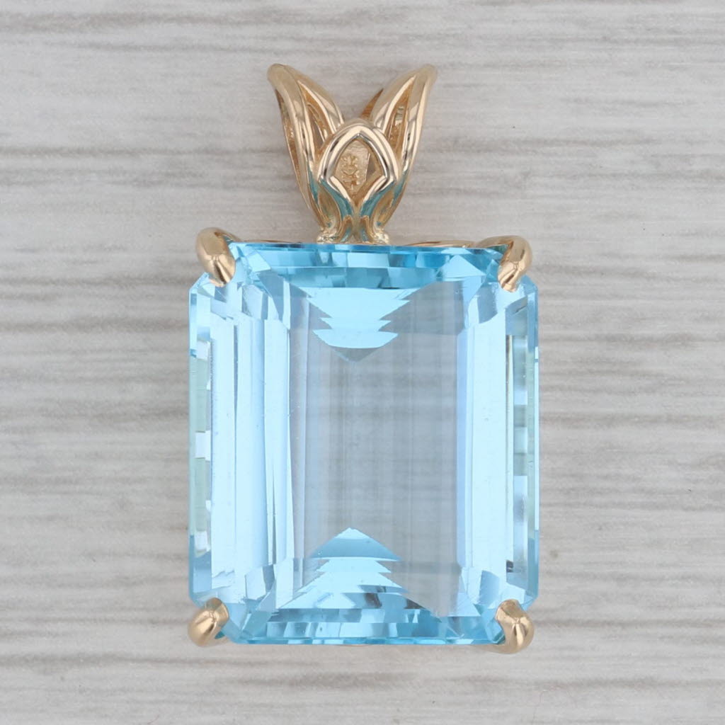 Gray 23.30ct Blue Topaz Emerald Cut Solitaire Pendant 14k Yellow Gold