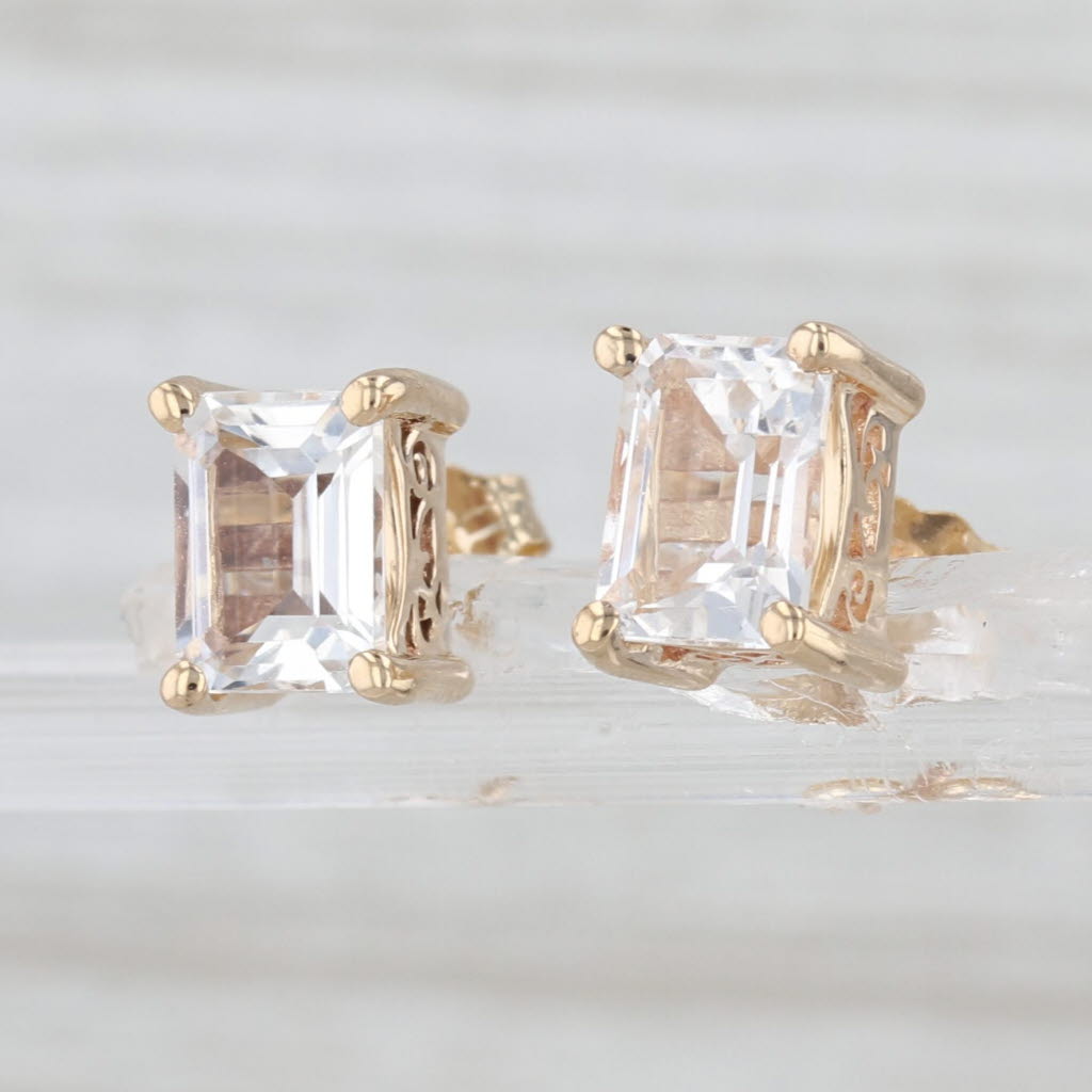 2.50ctw Colorless Topaz 10k Yellow Gold Emerald Cut Solitaire Studs