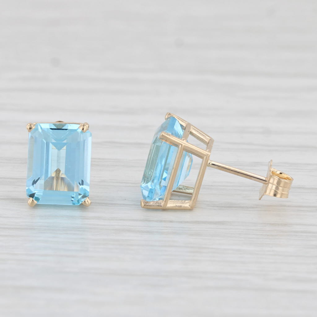 Light Gray 6ctw Blue Topaz Stud Earrings 14k Yellow Gold Emerald Cut Solitaires