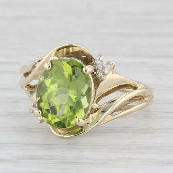3.08ctw Oval Peridot Ring 10k Yellow Gold Size 7.5 Diamond Accents