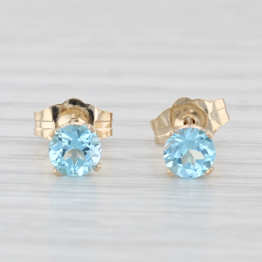Light Gray 0.60ctw Blue Topaz Round Solitaire Stud Earrings 14k Yellow Gold