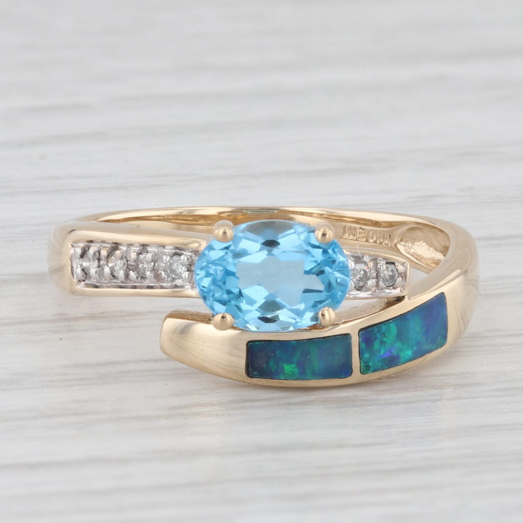 Light Gray 1.03ctw Blue Topaz Diamond Opal Bypass Ring 14k Yellow Gold Size 7