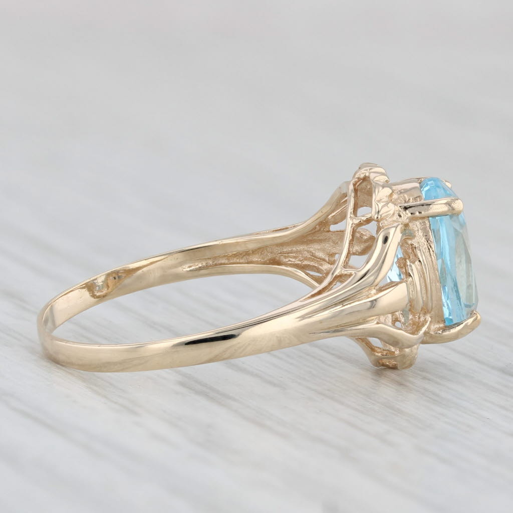 Light Gray 2.15ctw Oval Blue Topaz Solitaire Ring 10k Yellow Gold Size 6.5