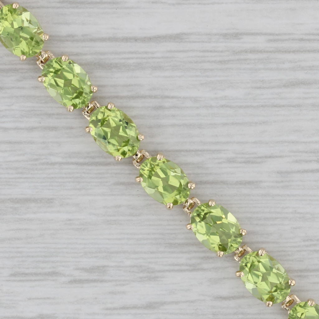 Gray 17.50ctw Peridot Tennis Bracelet 14k Yellow Gold 7.25" 5mm