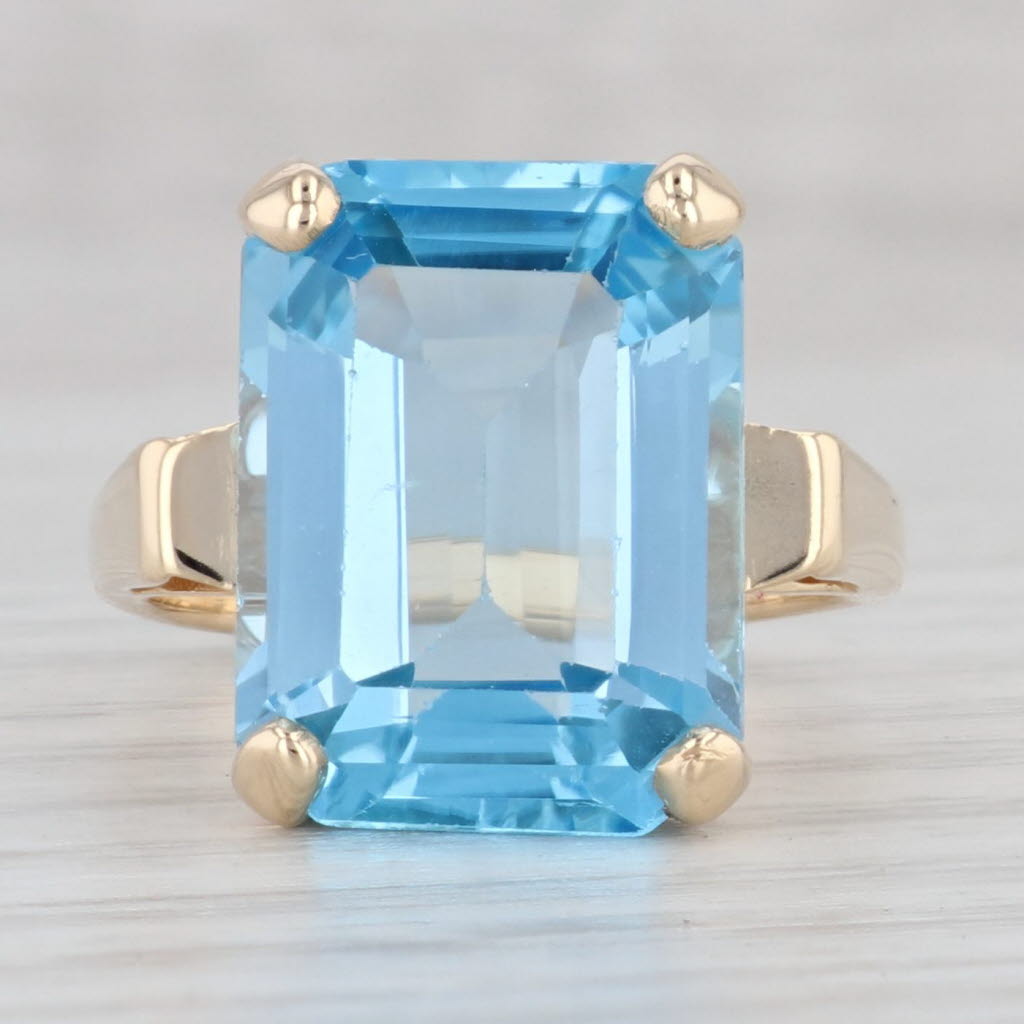 Light Gray 13ct Emerald Cut Blue Topaz Solitaire Ring 14k Yellow Gold Size 7.25