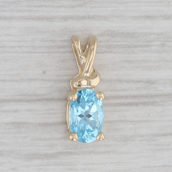 Gray 0.55ct Oval Blue Topaz Pendant 10k Yellow Gold Small Drop