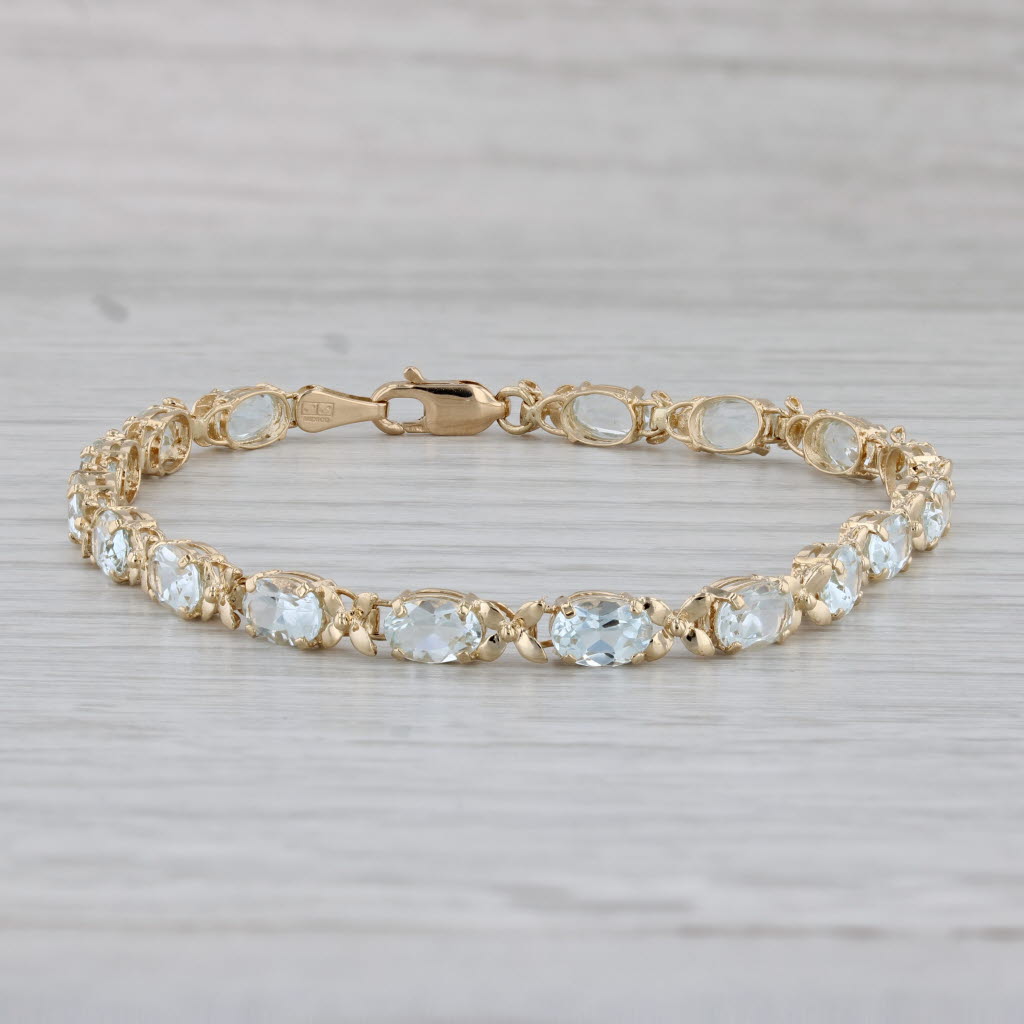 Gray 6.80ctw Oval Aquamarine Floral Tennis Bracelet 14k Yellow Gold 7" 4.2mm