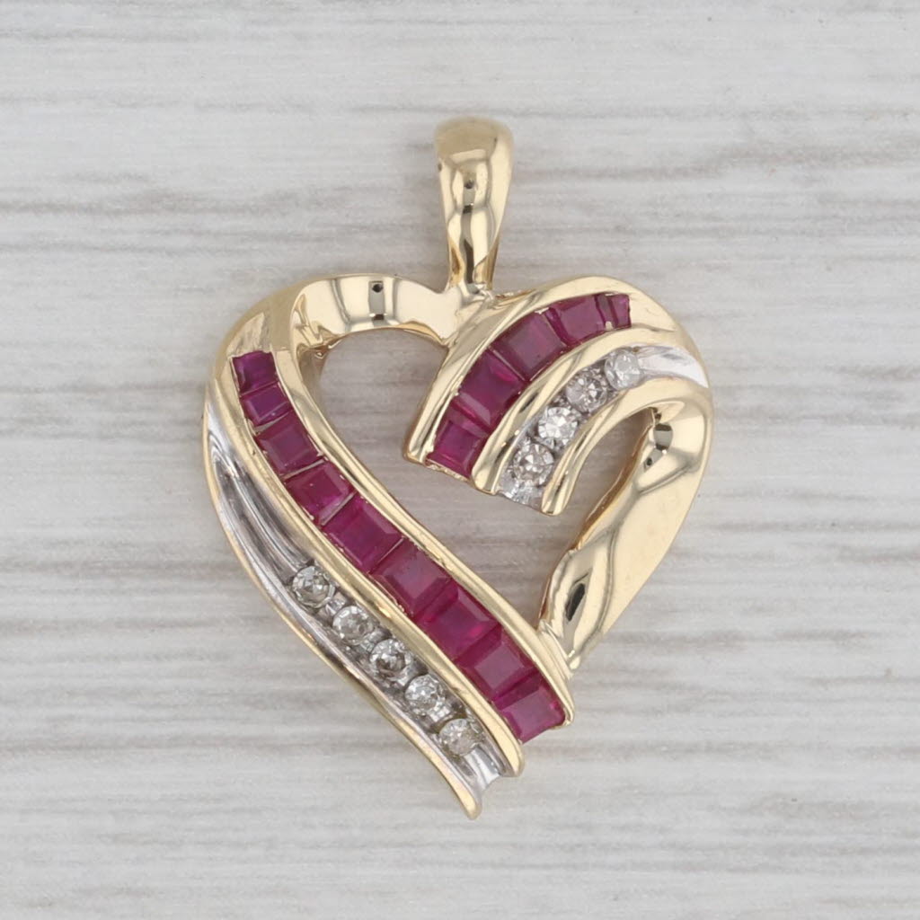 Gray 0.81ctw Ruby Diamond Open Heart Pendant 10k Yellow Gold