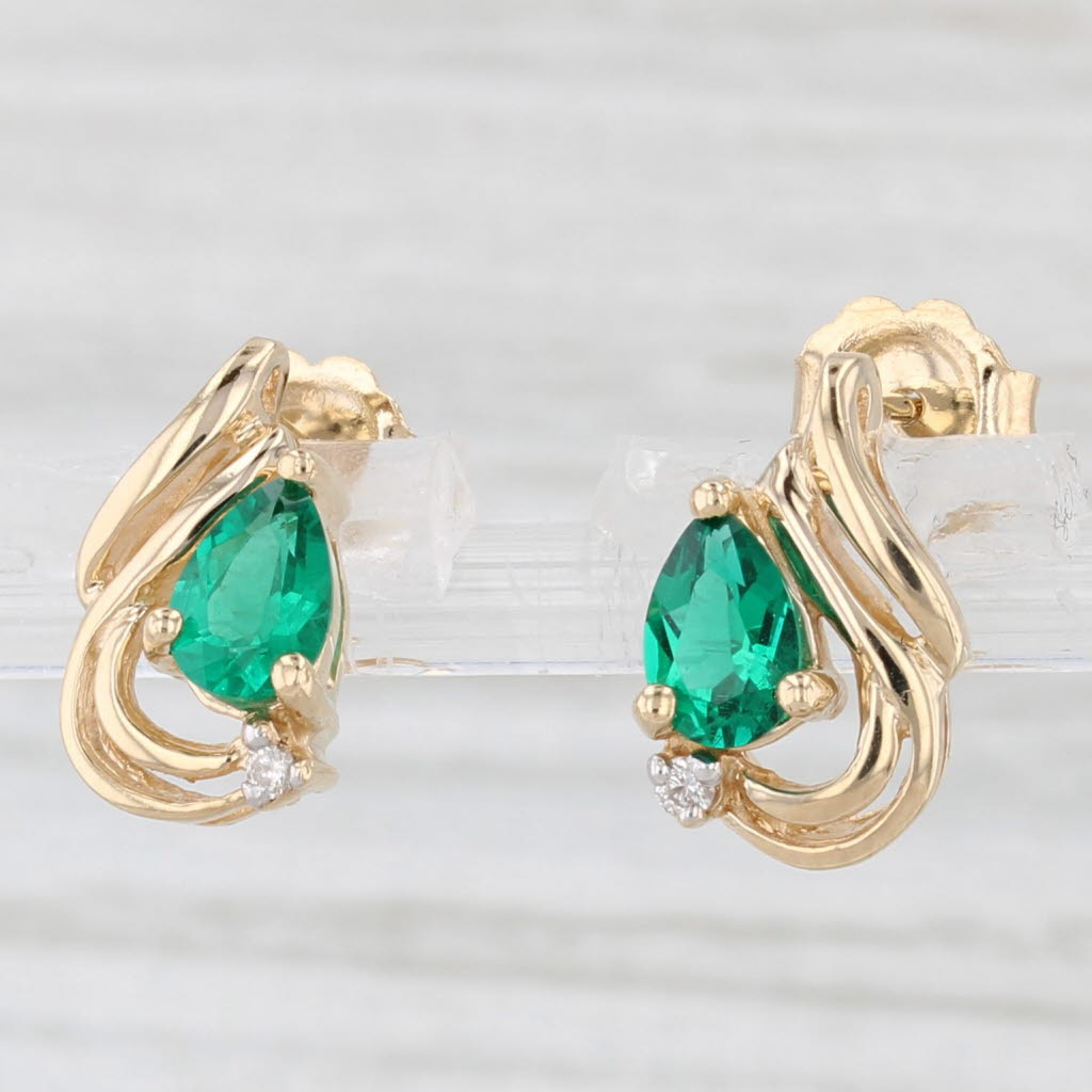 Light Gray 0.72ctw Lab Created Emerald Diamond Teardrop Stud Earrings 14k Yellow Gold