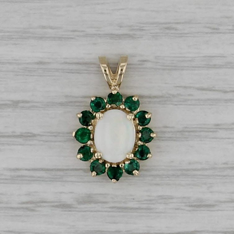 Opal Cabochon 0.72ctw Emerald Halo Pendant 14k Yellow Gold