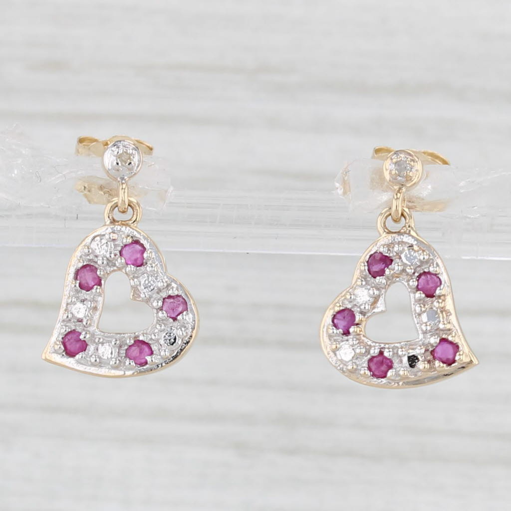 Light Gray 0.20ctw Ruby Diamond Heart Dangle Earrings 10k Yellow Gold