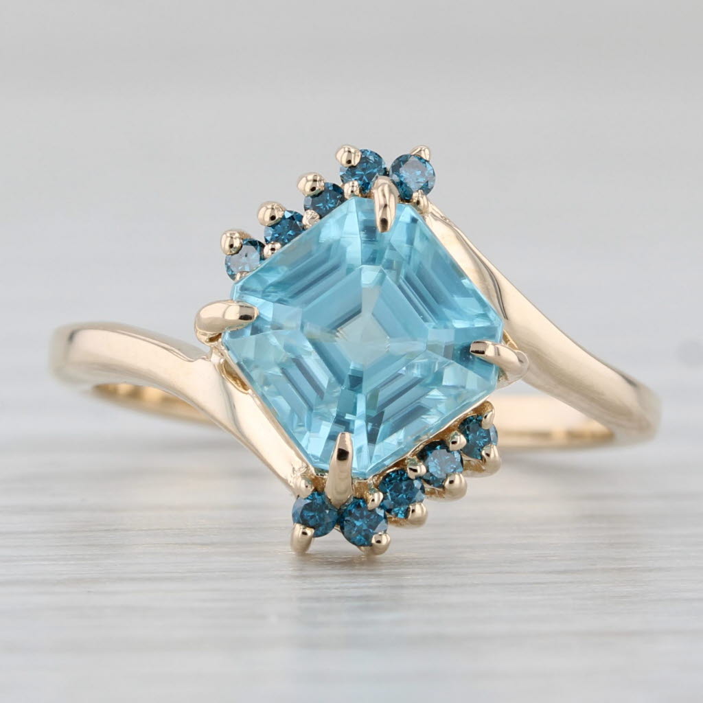 Light Gray 2.58ctw Blue Zircon Blue Diamond Bypass Ring 10k Yellow Gold Size 5