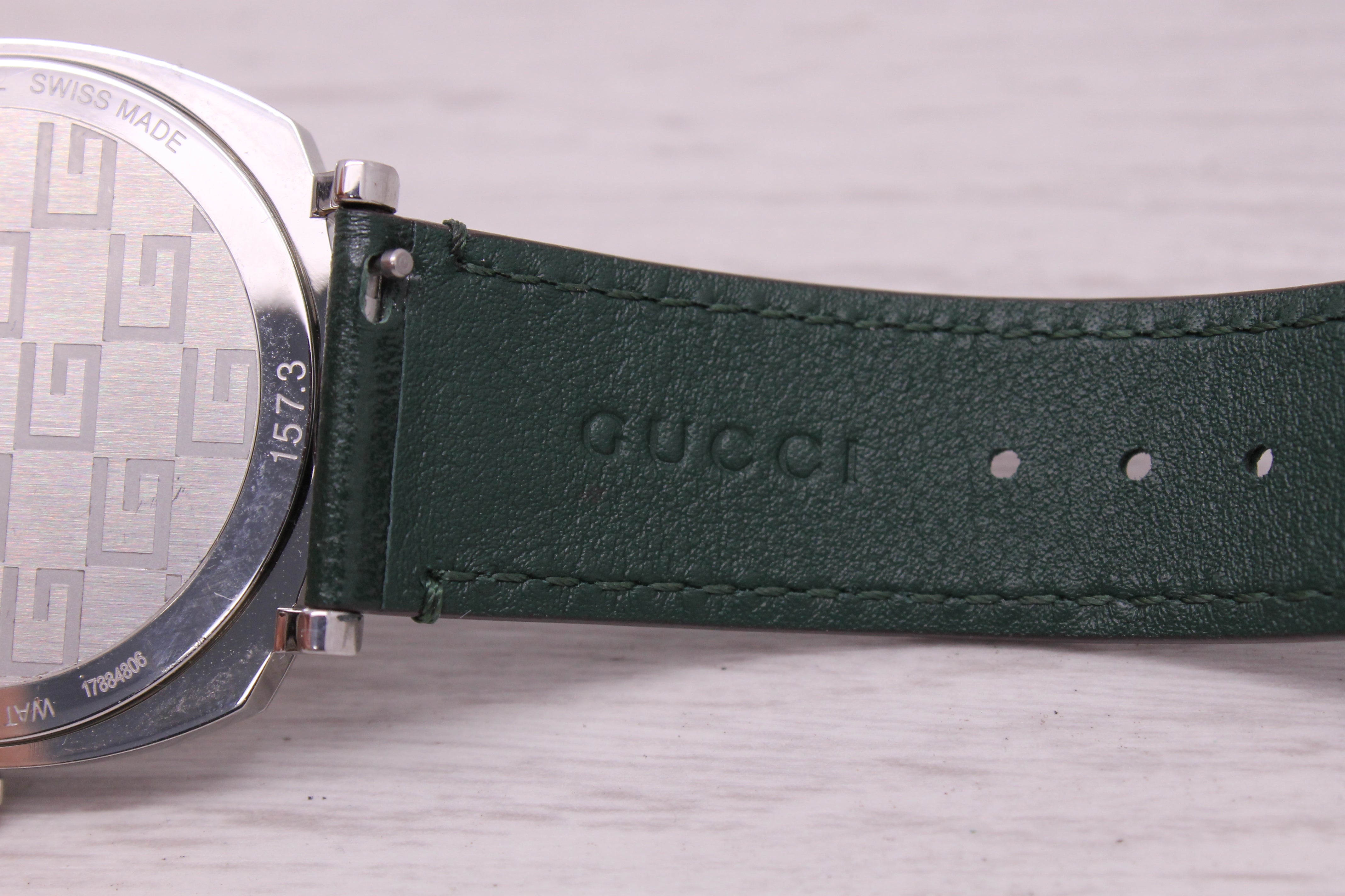 Dark Slate Gray Gucci Jump Hour 157.3 38mm Stainless Steel Quartz Watch w/ Green Strap & Box