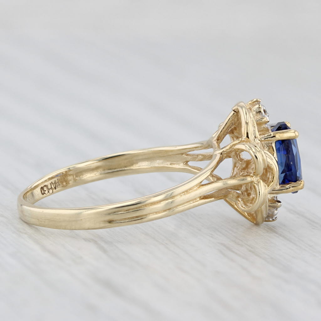 Light Gray 1.12ctw Oval Blue Lab Created Sapphire Diamond Ring 10k Yellow Gold Size 8.5