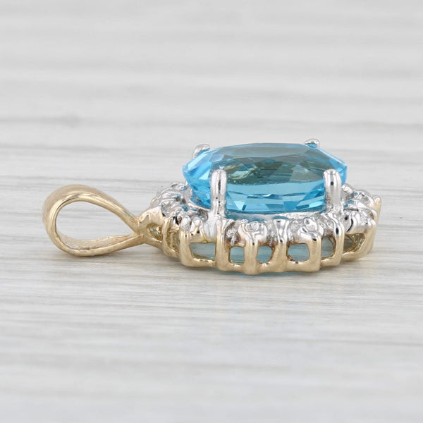 2.25ct Oval Blue Topaz Pendant 10k Yellow Gold Diamond Accents