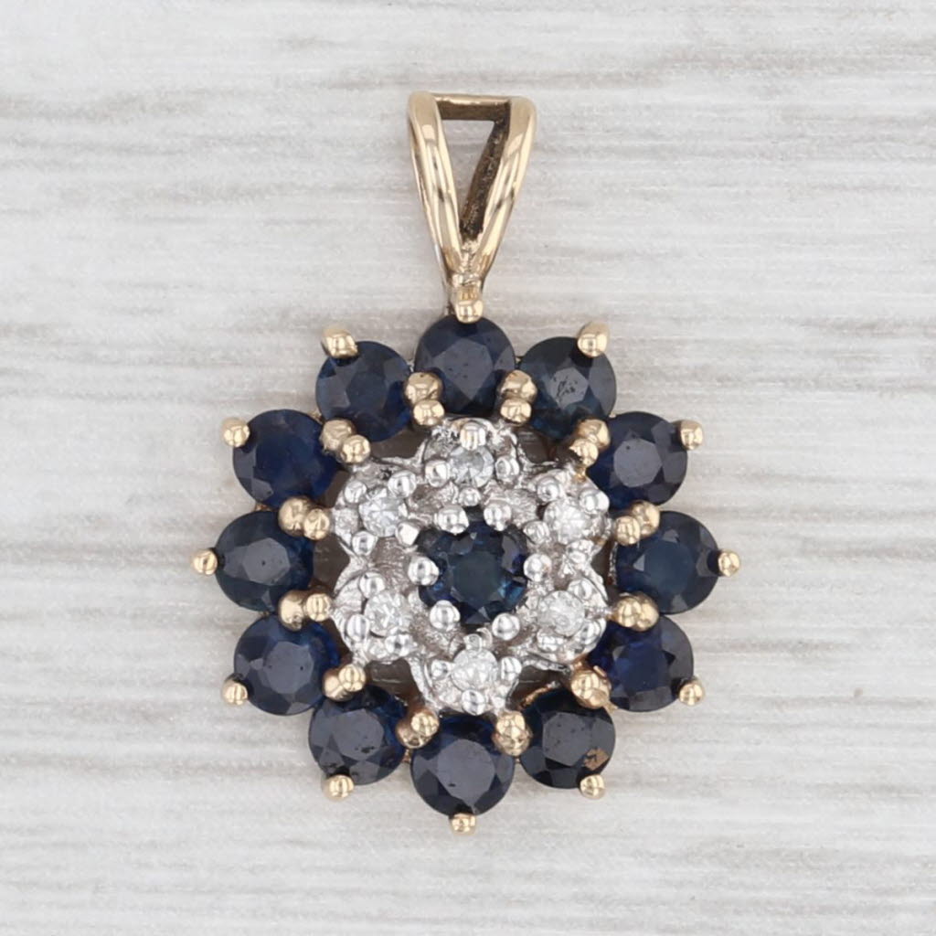 Light Gray 1.05ctw Blue Sapphire Diamond Flower Pendant 10k Yellow Gold