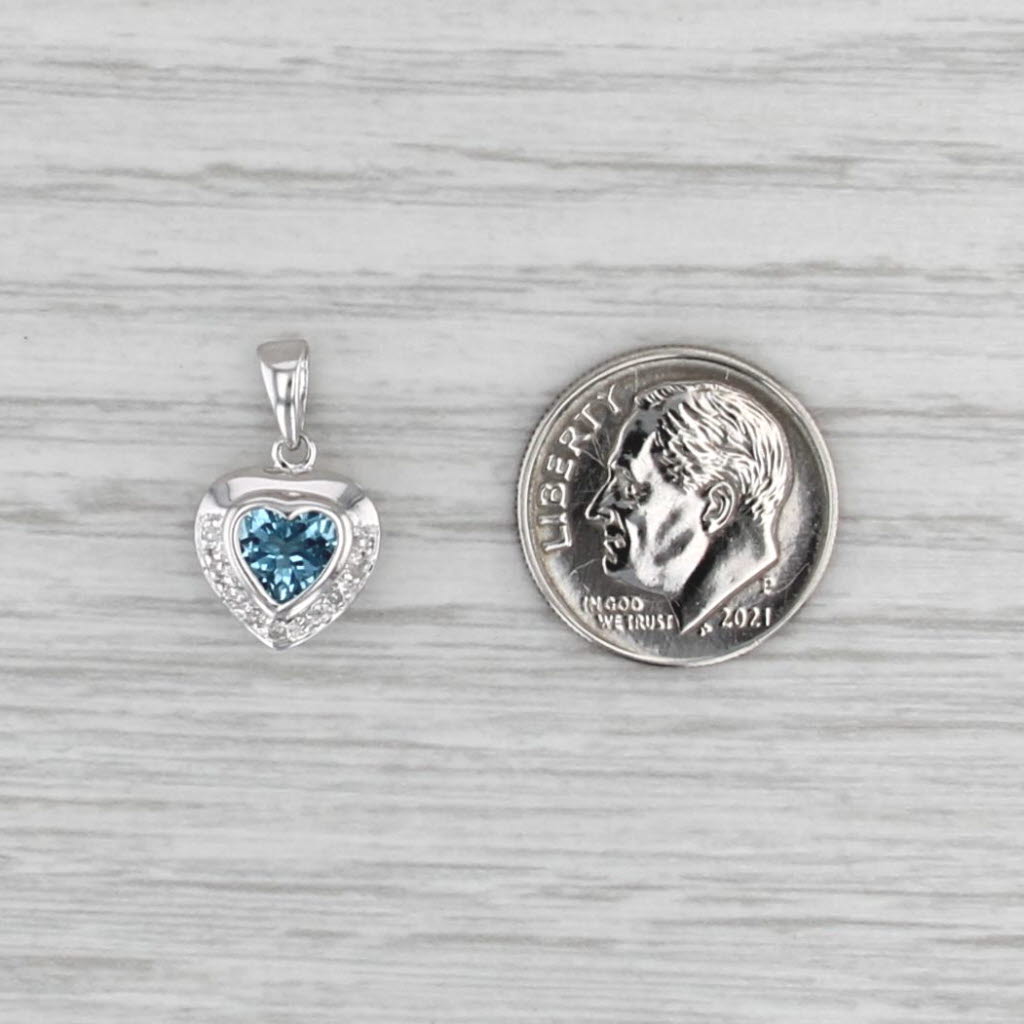 0.98ctw Blue Topaz Diamond Heart Pendant 14k White Gold