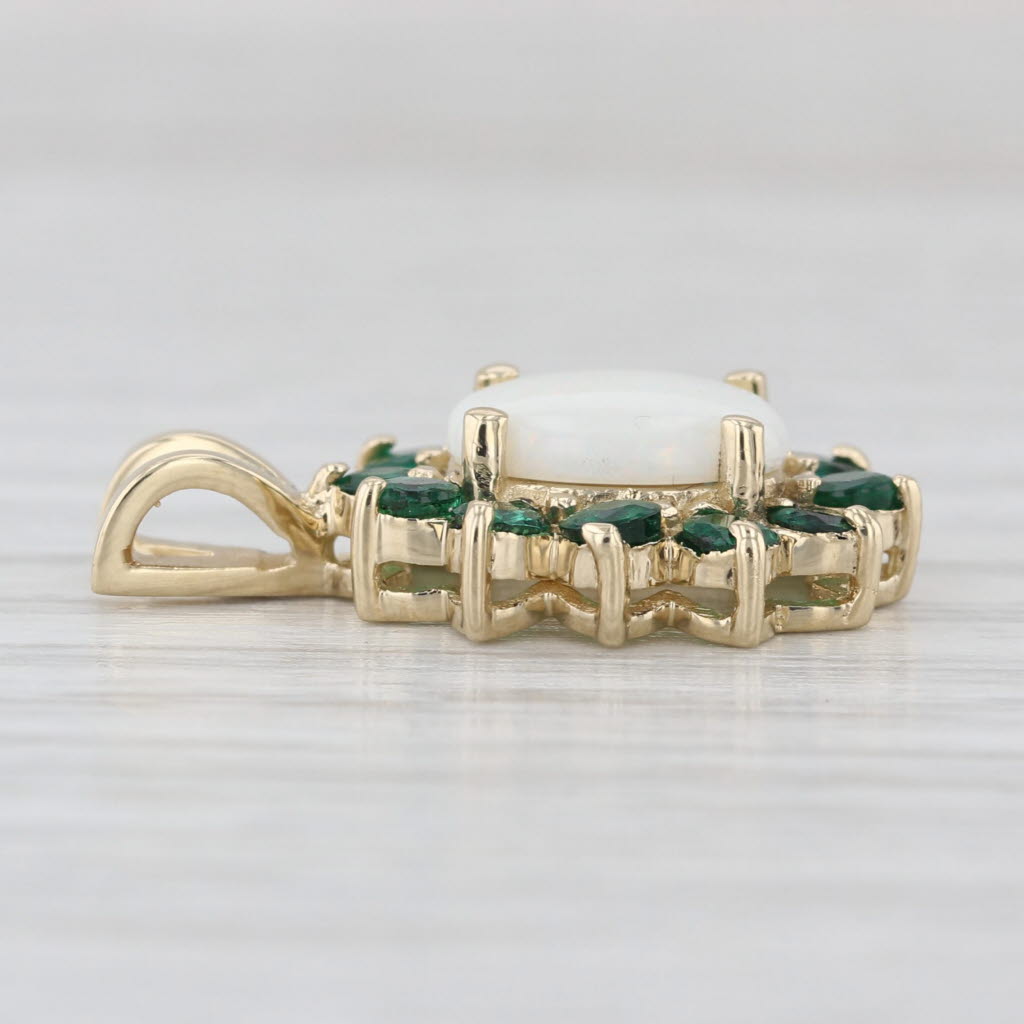 Opal Cabochon 0.72ctw Emerald Halo Pendant 14k Yellow Gold