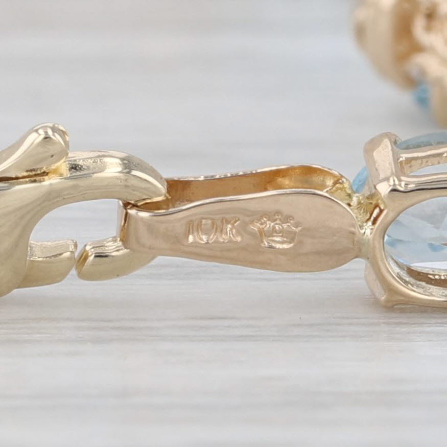 5.10ctw Blue Topaz Tennis Bracelet 10k Yellow Gold 7" 4.3mm