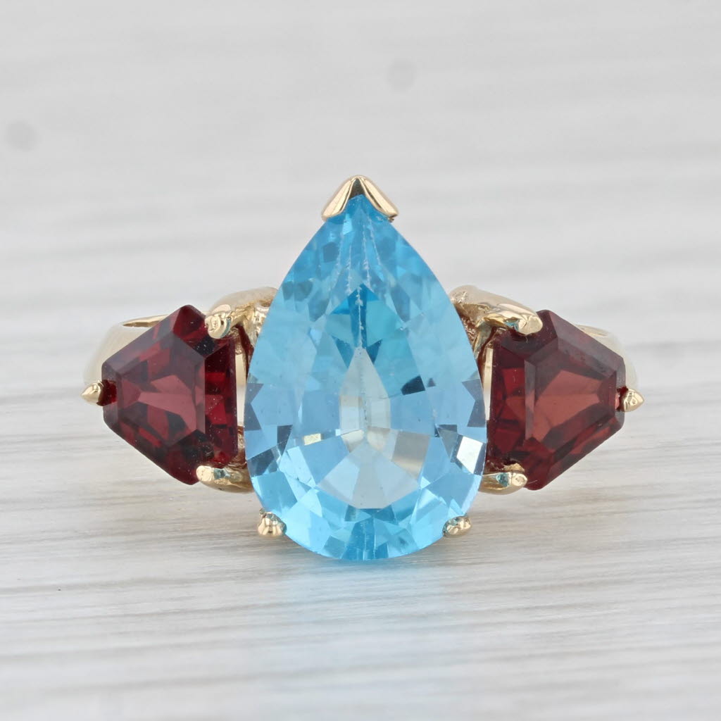 Light Gray 4.78ctw Pear Blue Topaz Garnet Ring 14k Yellow Gold Size 6