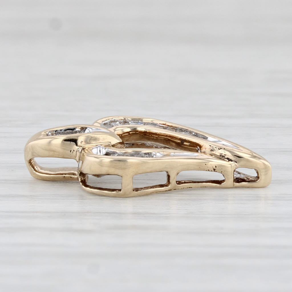 Light Gray 0.20ctw Diamond Baguette Open Heart Pendant 10k Yellow Gold