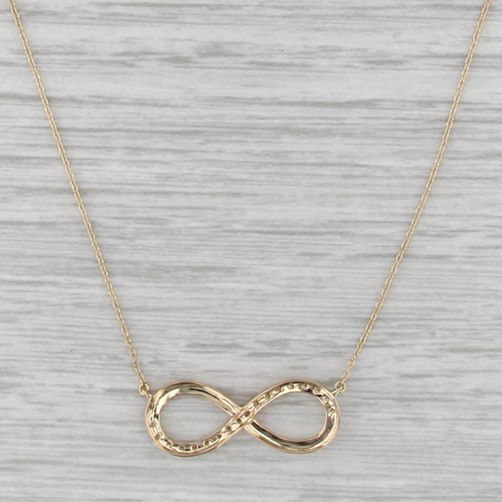0.16ctw Diamond Infinity Knot Pendant Necklace 18k Yellow Gold 16.25-17.75"