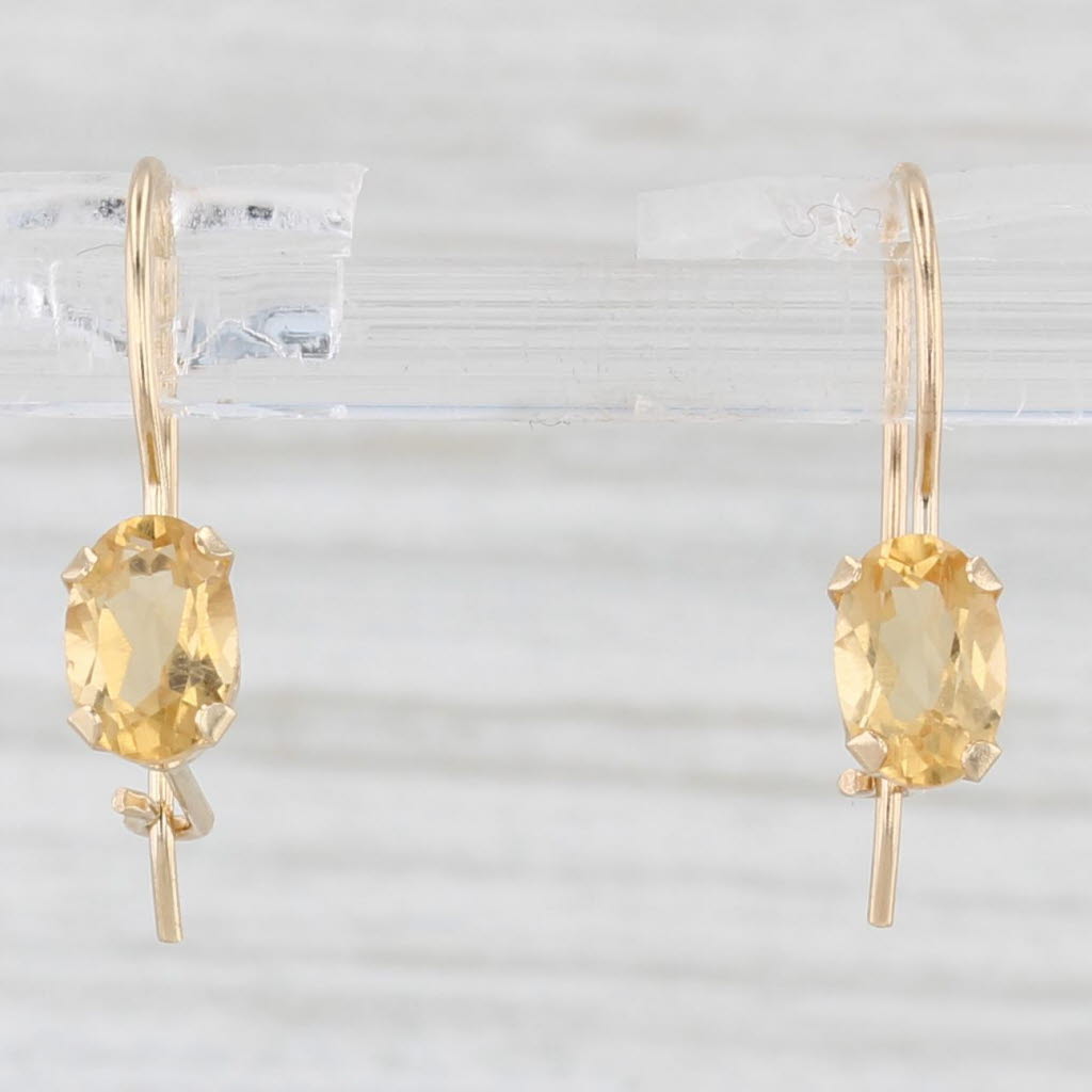 Light Gray 0.80ctw Oval Solitaire Citrine Drop Earrings 14k Yellow Gold Hook Posts