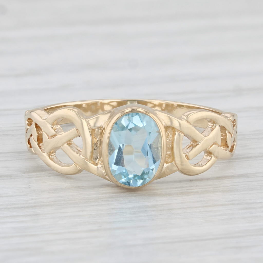 Light Gray 1ct Blue Topaz Knotwork Ring 14k Yellow Gold Size 8.25 Oval Solitaire