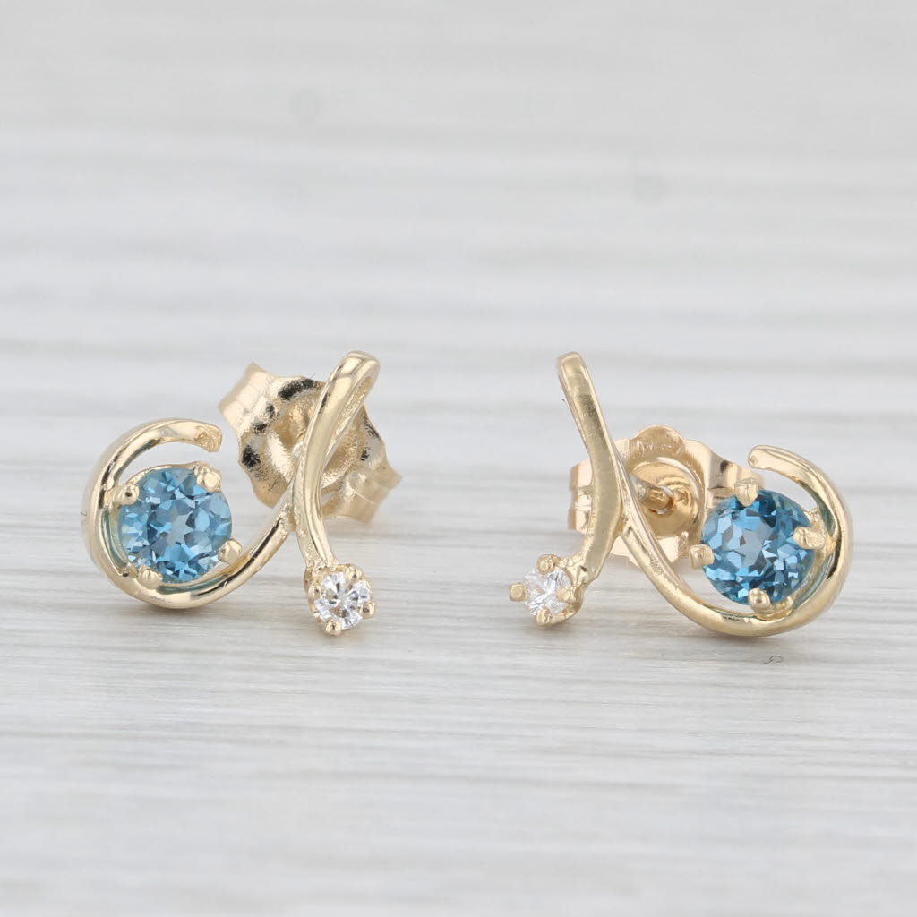 Light Gray 0.48ctw Blue Topaz Diamond Swirl Stud Earrings 14k Yellow Gold